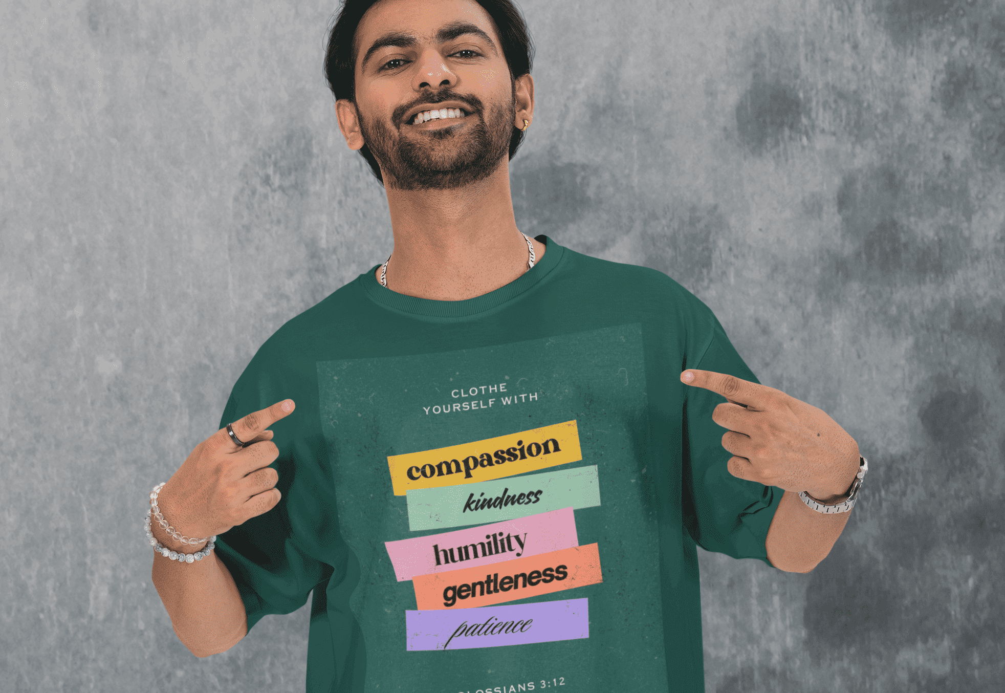 mockup of a cheerful man pointing at his oversized round neck t shirt in a studio m53040 (1)